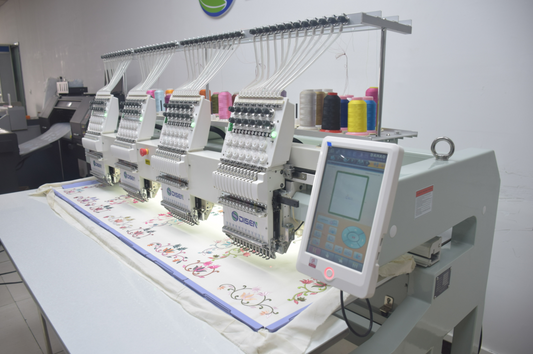 DISEN DSC-J1204 | 4-Head 12-Needle High-Speed Embroidery Machine with 12” Touchscreen – Cap, T-Shirt, and Logo Embroidery